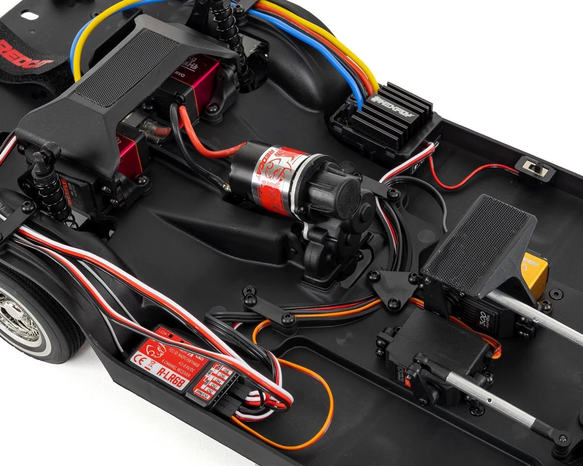 Redcat SixtyFour "Kandy N Chrome" 1/10 RTR Scale Hopping Lowrider (Green) w/2.4GHz Radio 7 Redcat SixtyFour "Kandy N Chrome" 1/10 RTR Scale Hopping Lowrider (Green) w/2.4GHz Radio - Image 7